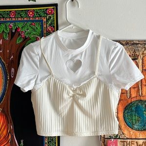 white and cream shirt with heart cut out. this is one single shirt not two